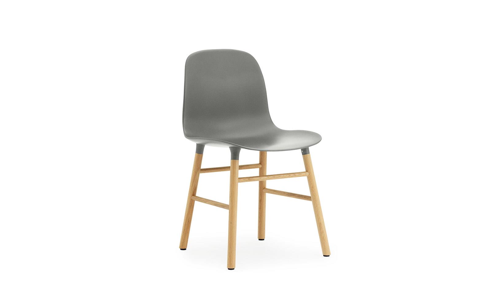 Form Chair Molded plastic shell with oak legs